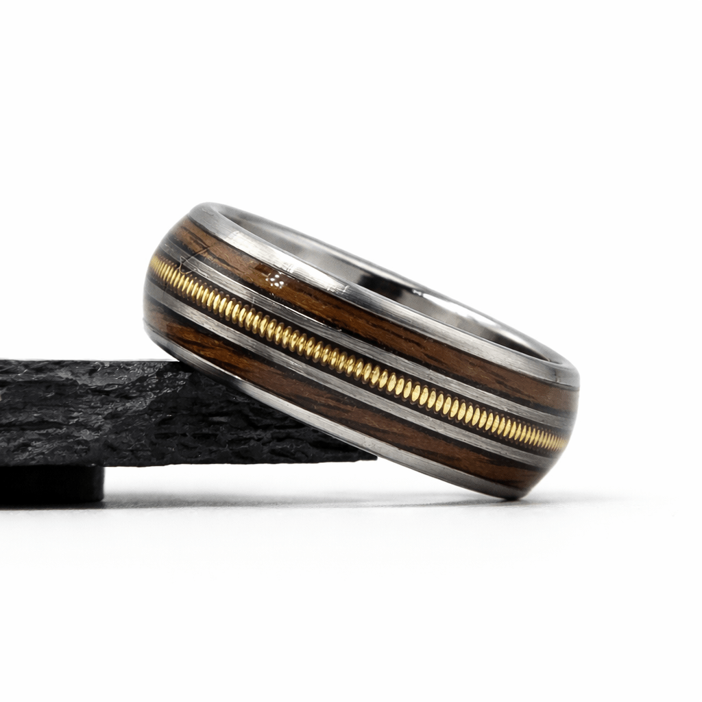 The Gibson - Walnut & Guitar string ring