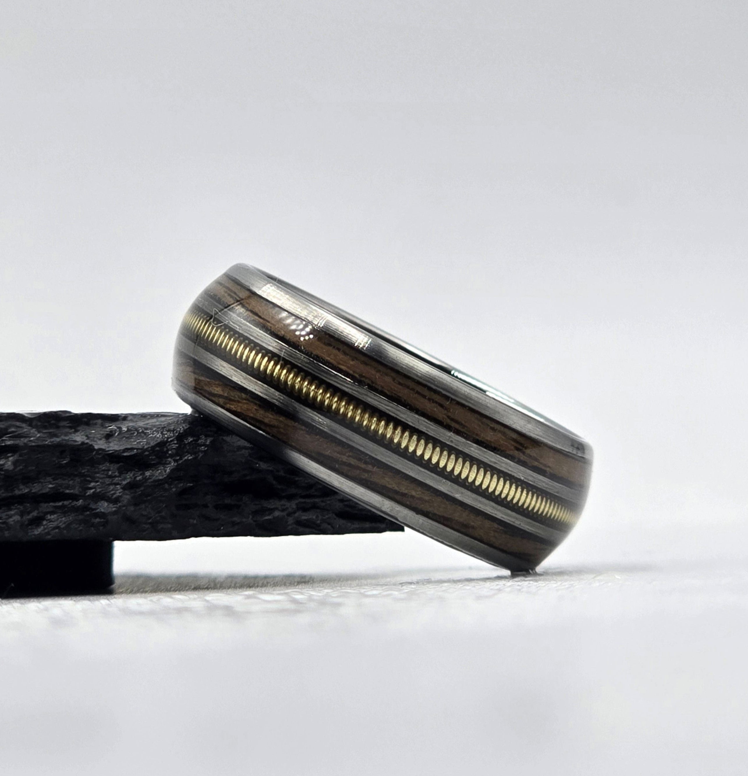 The Gibson - Walnut & Guitar string ring